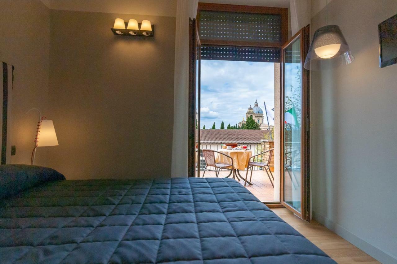 Hotel Moderno Assisi Bagian luar foto